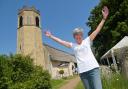 All Saints Church in Old Buckenham has been taken off Historic England's 'at risk' register following the completion of the Raise the Roof project. Pictured is its project lead, Alison Hannah
