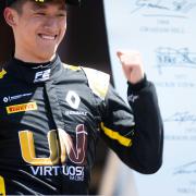 Guan Yu Zhou celebrating his third place in the second of the FIA Formula 2 races at the Paul Ricard Circuit in France for the UNI-Virtuosi team based at Attleborough Picture: Joe Portlock/LAT