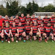 Wymondham line up for a team photograph after clinching promotion at West Norfolk on Saturday Picture: CLUB