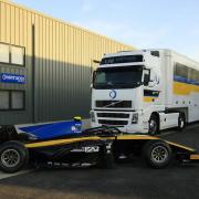 The team truck and Luca Ghiotto'’s Formula 2 car outside the new purpos- built workshop of Virtuosi Racing in Attleborough Picture: Andy Roche/Virtuosi Racing