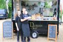 Clare Whitmore and Adam Davies with their son Connor at their street food van The Durban Grill, which will be at the Wymondham Food and Drink Festival.