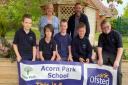 Philippa Whipp and Peter Marshall with pupils from Acorn Park School celebrating its good Ofsted result