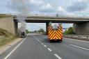 Fire crews at the scene of a car fire on the A11 at Larling.