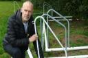 Chairman of Hethersett Athletic Football Club, Neal Luther, showing the recent vandalism