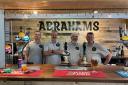 Ethan, Damon Kent (chairman of the committee, Chris and Steve behind the bar at Abraham's Bar and Clubhouse