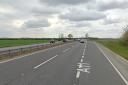 A section of the A11 was partially blocked following a crash