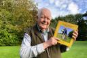 Veteran Norfolk farmer and journalist David Richardson with his new book, 'Around the World in Many Ways'