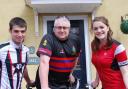 Dave Bickel (centre), his daughter Amiee (right) and her boyfriend Jake Grossman (left) will be cycling the Prudential RideLondon 100 for blind veterans.