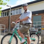 Councillor Robert Savage, County Councillor for Wymondham on a beryl bike.