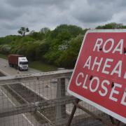 Part of the A11 is closed as a result of a carriageway defect