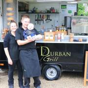 Clare Whitmore and Adam Davies with their son Connor at their street food van The Durban Grill, which will be at the Wymondham Food and Drink Festival.