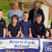 Philippa Whipp and Peter Marshall with pupils from Acorn Park School celebrating its good Ofsted result