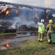 Firefighters at the fire in a large barn at Winfarthing