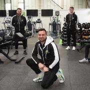 Nathan Gostling, front, with his team of managers in his latest New Revolution (NR) gym, which is at Watton. From left, Scott Butters, Aaron Johnson, Vincent Willard and Jack Marshall.