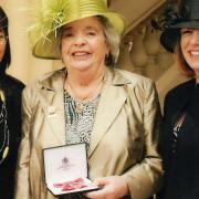 Doris Langford with her MBE and daughters, Sara-Jane Maskell (left) and Elizabeth Hovey (right)