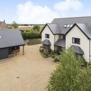 A five-bed home fitted with solar panels and an electrical vehicle charging point has come up for sale in Wicklewood, near Wymondham, for £1.25m